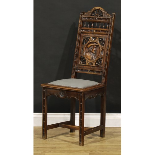 1348 - A set of six French Arts & Crafts period oak dining chairs, in the Henry II taste, each back carved ... 