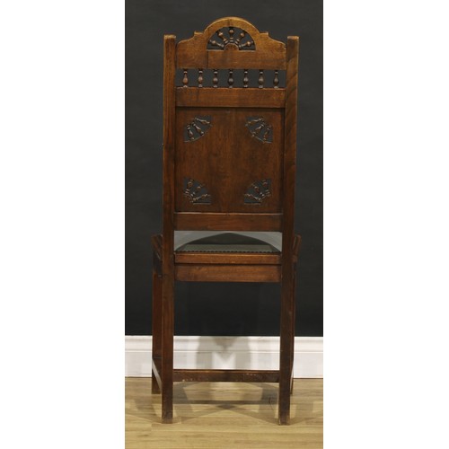 1348 - A set of six French Arts & Crafts period oak dining chairs, in the Henry II taste, each back carved ... 