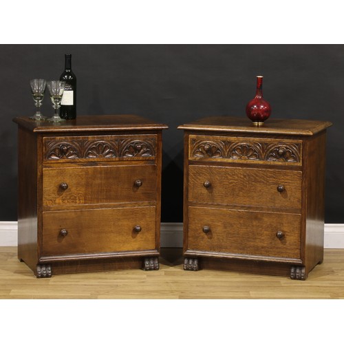 1279 - A pair of oak chests, by Rupert/Nigel Griffiths Monastic Woodcraft, each with a rectangular top with... 