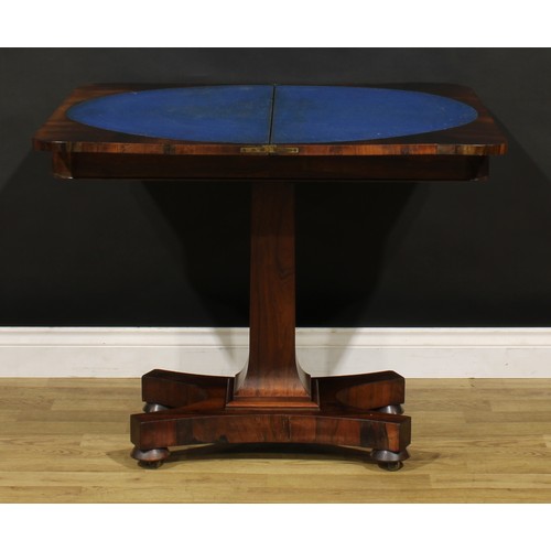 1876 - A William IV rosewood card table, hinged top enclosing a baize lined playing surface, spreading squa... 