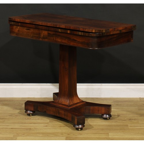 1876 - A William IV rosewood card table, hinged top enclosing a baize lined playing surface, spreading squa... 