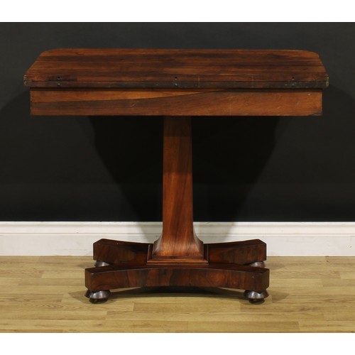 1876 - A William IV rosewood card table, hinged top enclosing a baize lined playing surface, spreading squa... 