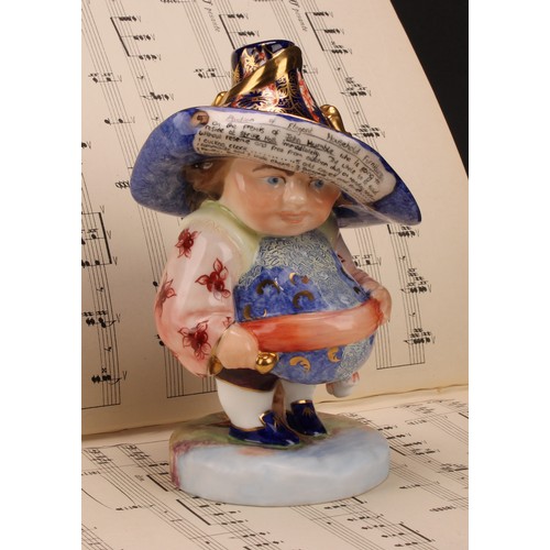 120 - A Royal Crown Derby Mansion House dwarf, standing, wearing a broad brimmed Imari solid gold band hat... 