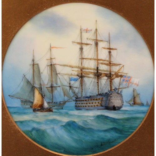 123 - An English porcelain circular plaque, possibly Lynton, painted by Stephan Nowacki, signed, with gall... 