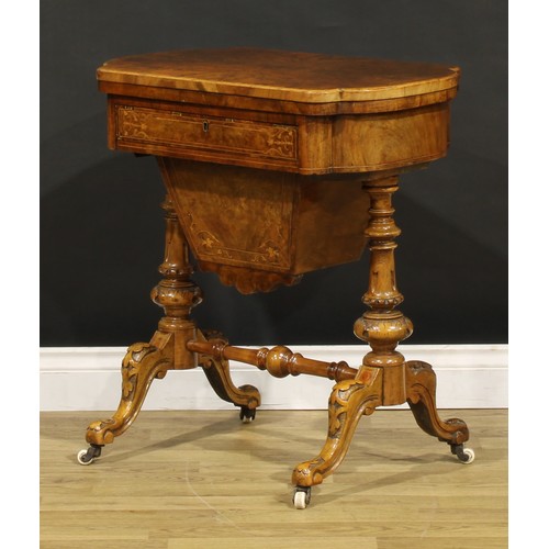 1869 - A Victorian walnut combination work and games table, hinged top enclosing parquetry fields inlaid fo... 