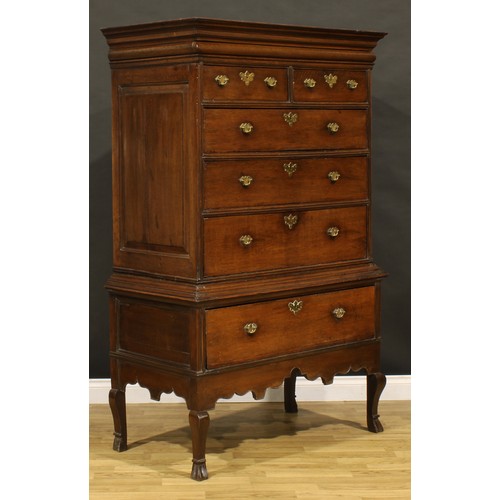 1189 - A George III oak chest on stand, moulded cornice with convex moulded capital drawer above two short ... 