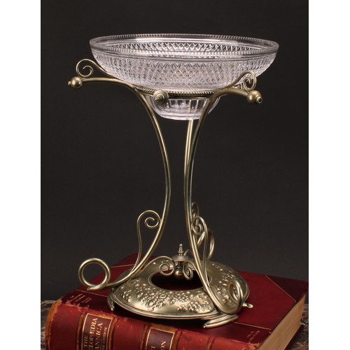 574 - An early 20th century E.P.N.S table centrepiece epergne, hobnail-cut glass bowl above three scrolls,... 