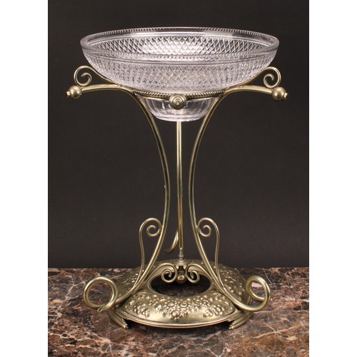 574 - An early 20th century E.P.N.S table centrepiece epergne, hobnail-cut glass bowl above three scrolls,... 