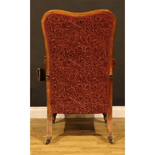 1874 - A William IV mahogany reclining library chair, stuffed-over upholstery, the arm applied with The Pat... 