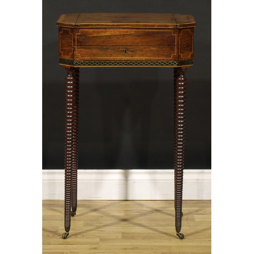 1428 - A Regency rosewood combination work and games table, canted rectangular top with removable sliding p... 