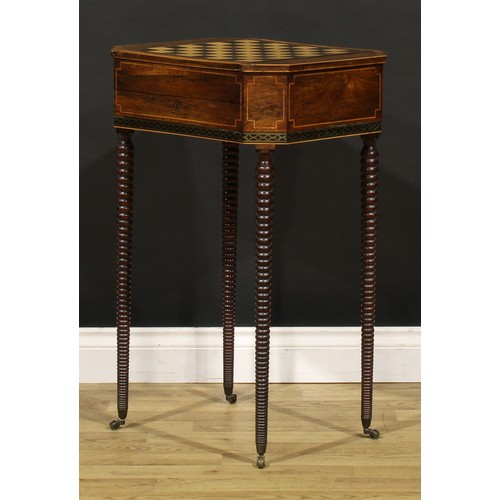 1428 - A Regency rosewood combination work and games table, canted rectangular top with removable sliding p... 