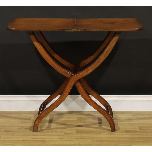 1395 - A 19th century mahogany folding coaching table, rounded rectangular top, shaped chamfered legs, turn... 