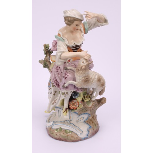 142 - A pair of 19th century porcelain figures, of a shepherd and shepherdess, decorated in polychrome, bo... 