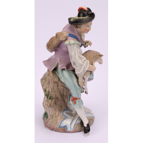 142 - A pair of 19th century porcelain figures, of a shepherd and shepherdess, decorated in polychrome, bo... 