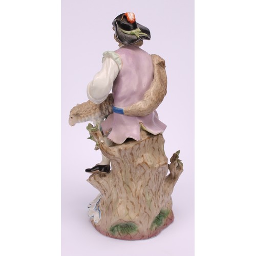 142 - A pair of 19th century porcelain figures, of a shepherd and shepherdess, decorated in polychrome, bo... 