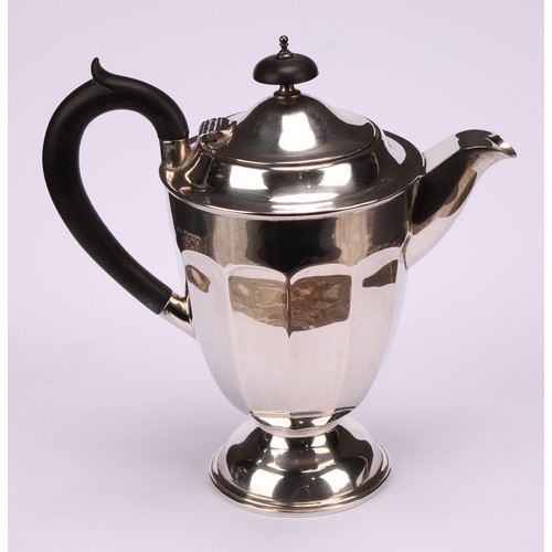 602 - A composed silver four piece tea service, Edward Viner, Sheffield 1930/1938; a silver shaped circula... 