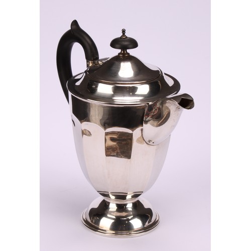 602 - A composed silver four piece tea service, Edward Viner, Sheffield 1930/1938; a silver shaped circula... 