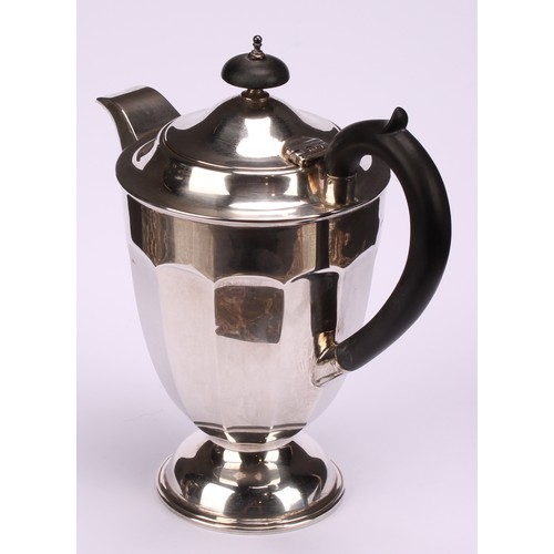 602 - A composed silver four piece tea service, Edward Viner, Sheffield 1930/1938; a silver shaped circula... 