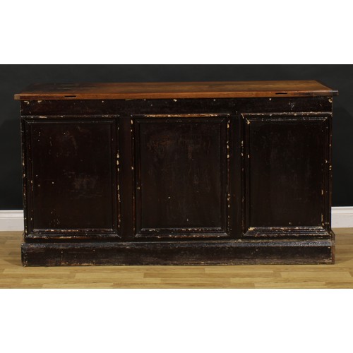 1437 - A Victorian mahogany and pine haberdashery shop counter, rectangular top above an arrangement of dra... 