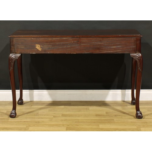 1404 - A George III Revival mahogany side or serving table, possibly Irish, moulded top above a pair of fri... 