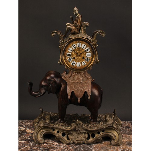 1557 - A late 19th century Rococo Revival bronze elephant clock, 11.5cm circular dial applied with enamel c... 