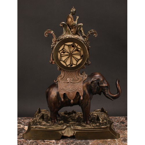 1557 - A late 19th century Rococo Revival bronze elephant clock, 11.5cm circular dial applied with enamel c... 