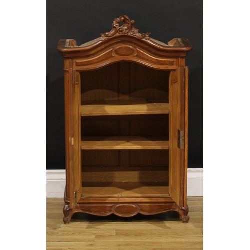 1941 - Miniature Furniture - a French Provincial walnut armoire, arched cresting carved with flowering C-sc... 