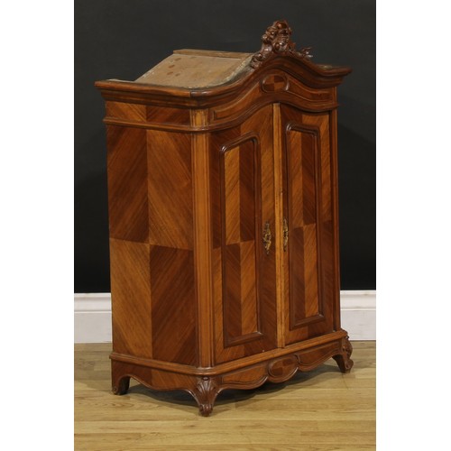 1941 - Miniature Furniture - a French Provincial walnut armoire, arched cresting carved with flowering C-sc... 