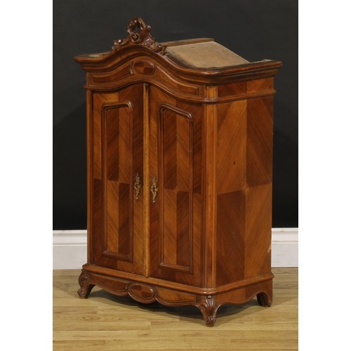 1941 - Miniature Furniture - a French Provincial walnut armoire, arched cresting carved with flowering C-sc... 