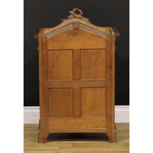 1941 - Miniature Furniture - a French Provincial walnut armoire, arched cresting carved with flowering C-sc... 