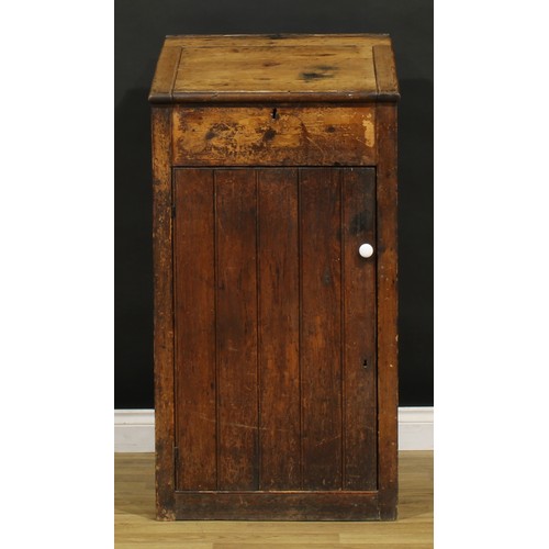 1199 - A late Victorian primitive vernacular pine porter’s or shopkeeper’s reception pedestal, hinged top a... 