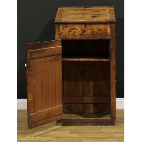 1199 - A late Victorian primitive vernacular pine porter’s or shopkeeper’s reception pedestal, hinged top a... 