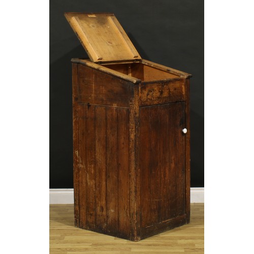 1199 - A late Victorian primitive vernacular pine porter’s or shopkeeper’s reception pedestal, hinged top a... 