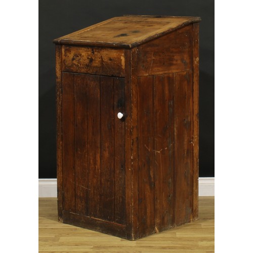 1199 - A late Victorian primitive vernacular pine porter’s or shopkeeper’s reception pedestal, hinged top a... 