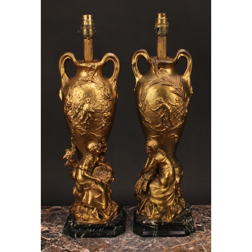 1295 - A pair of French gilt spelter figural table lamps, Allegory of Harvest, after Francois Moreau, model... 