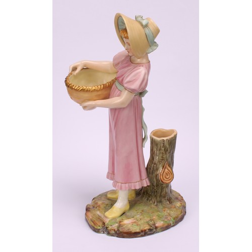 55 - A pair of Royal Worcester figural spill vases, modelled as a boy and girl, each carrying a basket, s... 