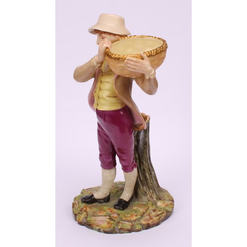 55 - A pair of Royal Worcester figural spill vases, modelled as a boy and girl, each carrying a basket, s... 