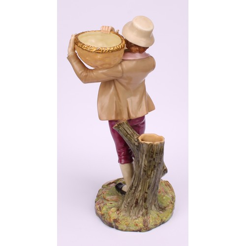 55 - A pair of Royal Worcester figural spill vases, modelled as a boy and girl, each carrying a basket, s... 