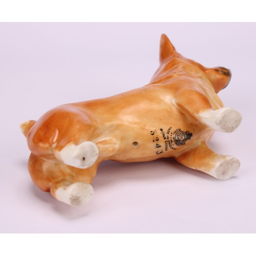 69 - A Royal Worcester model, of a Corgi, 9cm long, printed mark in black, shape 3243, date code for 1955... 