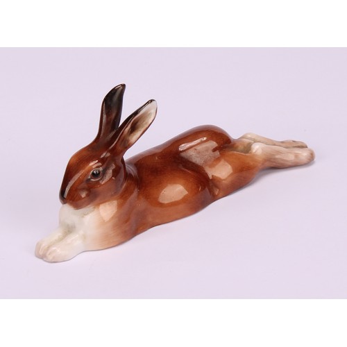 69 - A Royal Worcester model, of a Corgi, 9cm long, printed mark in black, shape 3243, date code for 1955... 