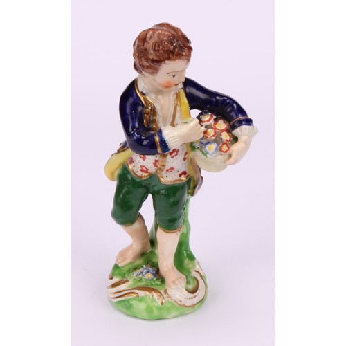 106 - A matched pair of Derby figures, Boy and Girl with Fruit and Flowers, he stands holding a basket of ... 