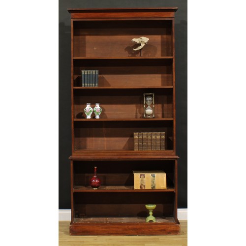 1354 - A Victorian mahogany open library bookcase, moulded cornice above an arrangement of adjustable shelv... 