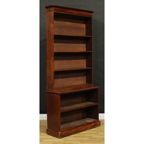 1354 - A Victorian mahogany open library bookcase, moulded cornice above an arrangement of adjustable shelv... 