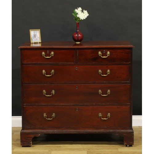 1393 - A 19th century mahogany chest, of two short and three long graduated drawers, skirted base, bracket ... 