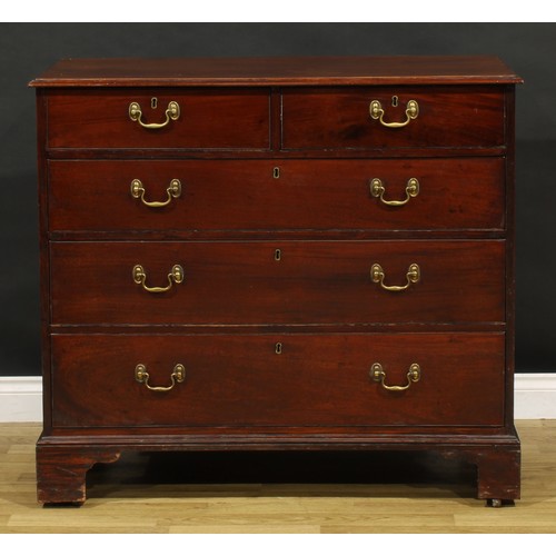 1393 - A 19th century mahogany chest, of two short and three long graduated drawers, skirted base, bracket ... 