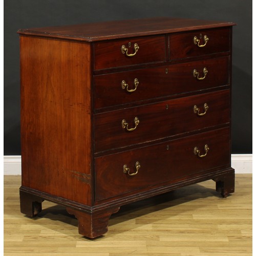 1393 - A 19th century mahogany chest, of two short and three long graduated drawers, skirted base, bracket ... 