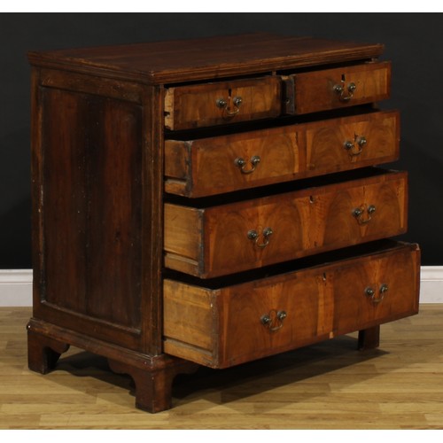 1359 - An 18th century and later walnut chest, rectangular top with moulded edge above two short and three ... 