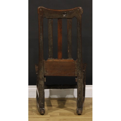 1222 - A Charles II oak side chair, later converted to a rocking chair, plank seat, turned front stretcher,... 