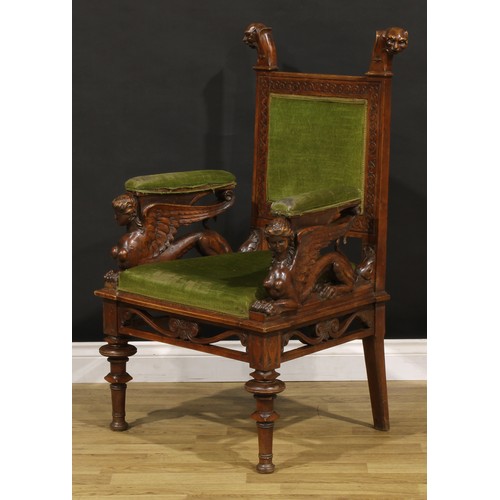 1386 - A 19th century Italian walnut armchair, rectangular back crested by zoomorphic finials, the sculptur... 