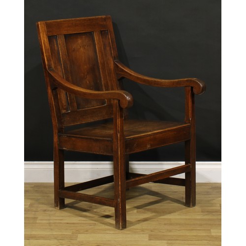 1314 - A 17th century style oak panel back armchair, scroll arms, square legs, 96cm high, 57cm wide, the se... 